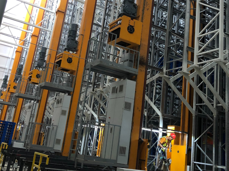 Stacker crane automated storage system