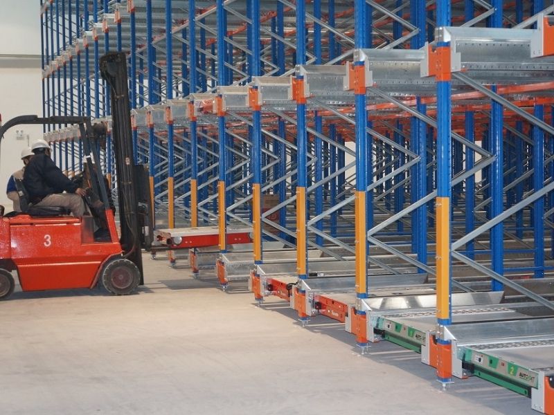 Forklift placing shuttle