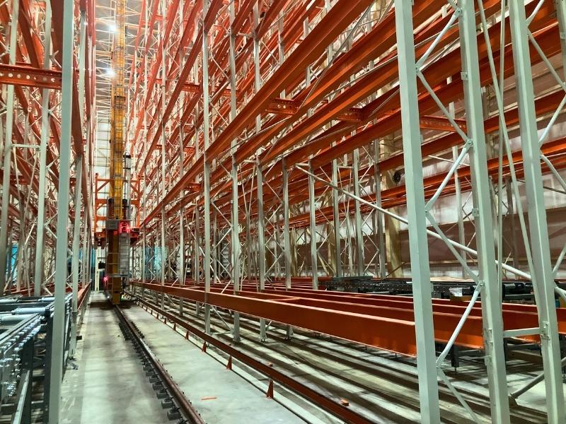 High-density heavy-duty pallet racks paired with stacker cranes