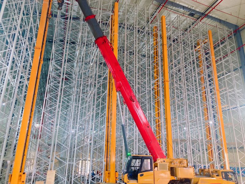 Stacker crane warehouse construction and installation