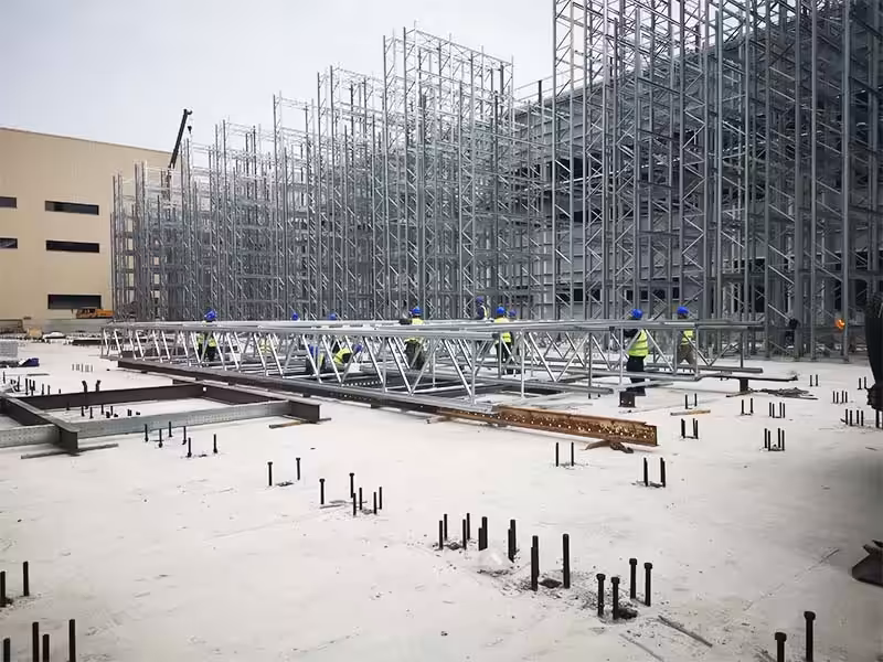 Structural engineering process during rack supported building construction