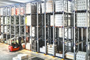 Forklift operating inside a drive-in pallet racking system