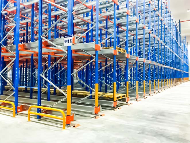 Shuttle racking installed in a cold storage warehouse for high-density pallet storage.